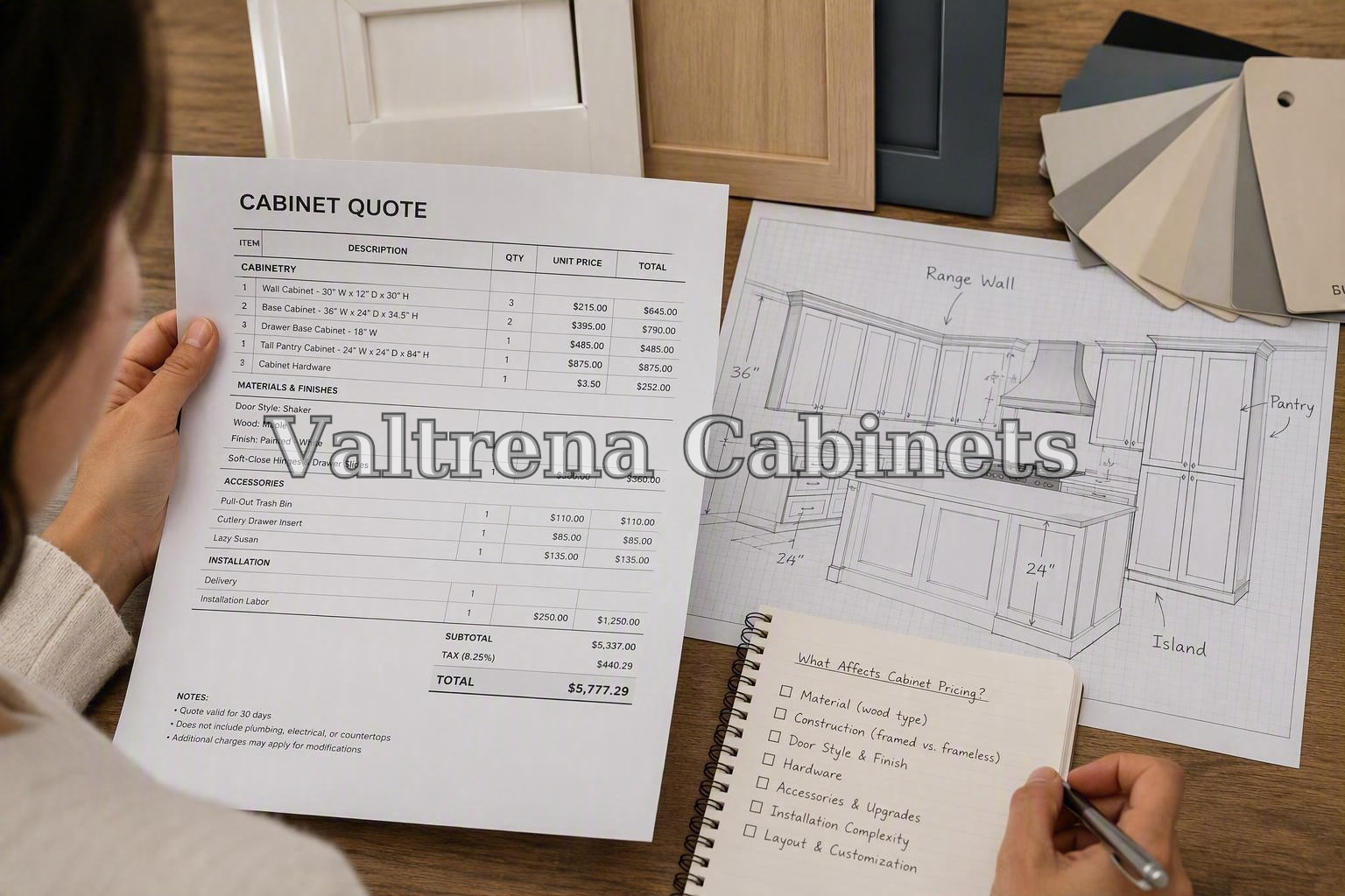 Homeowner comparing cabinet samples and online product specifications beside a kitchen layout